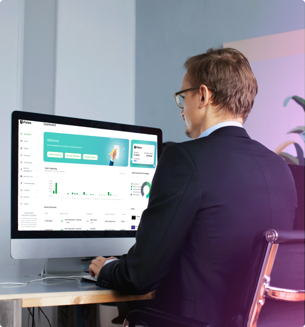 guy in a business suit sitting at a computer with the Finfare UI onscreen